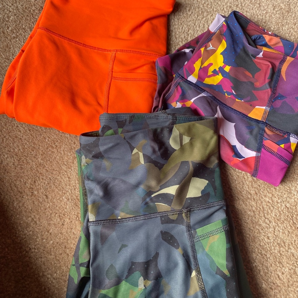 leggings 3 colors available size M  $12 each orange one is a Capri